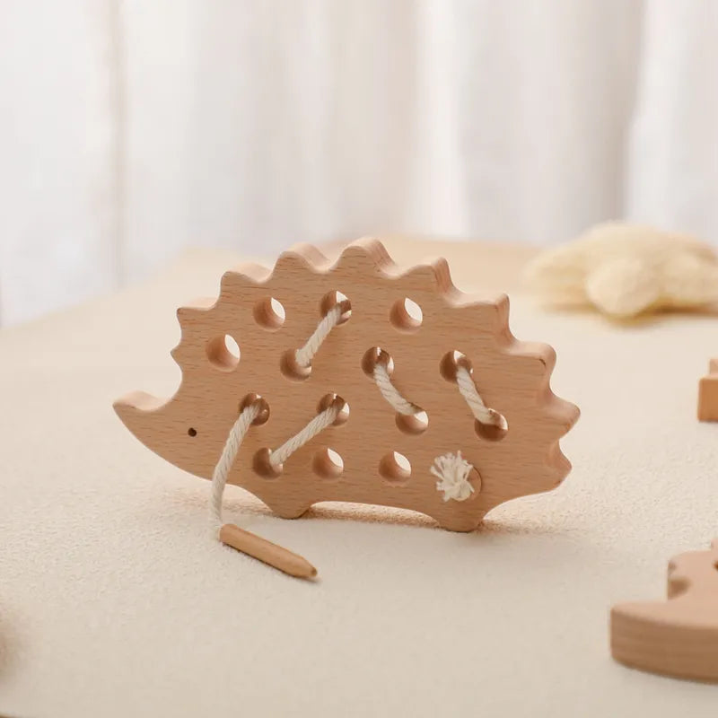 Juguete de madera para enhebrar Juguete de madera para enhebrar